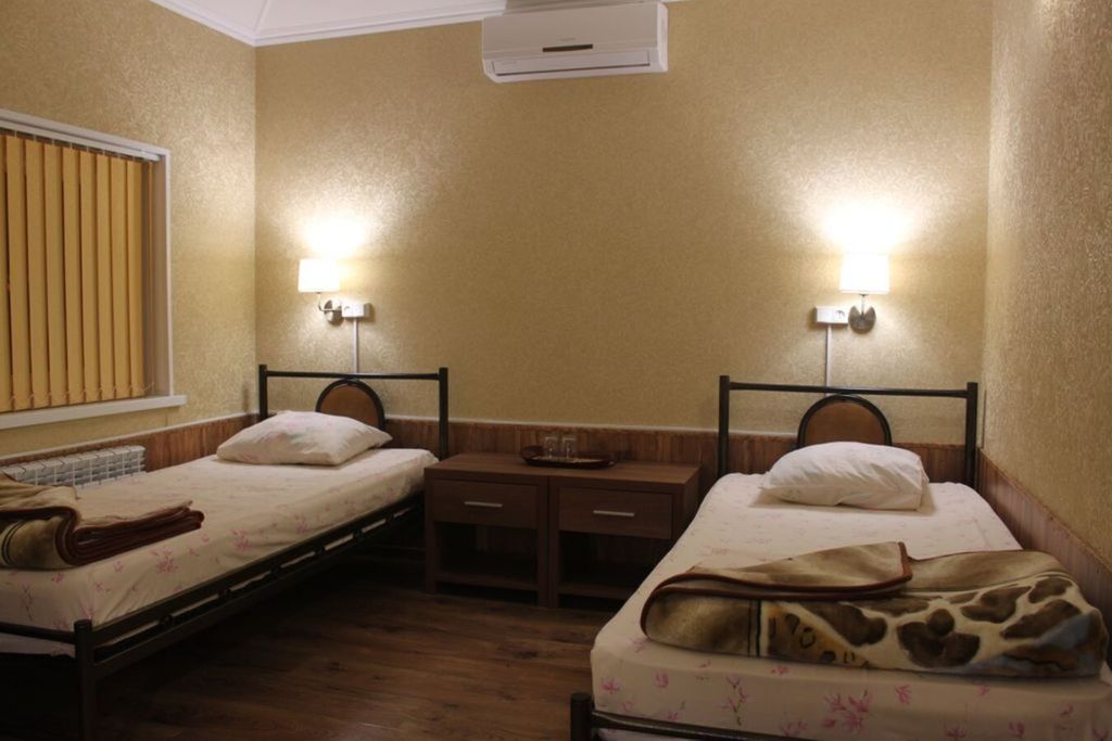 Двухместный номер с 2 отдельными кроватями стандарт