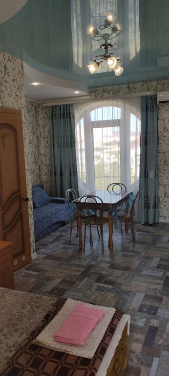 Семейный номер с выходом на террасу.