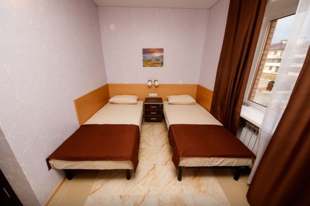 Двухместный номер с 2 отдельными кроватями стандарт