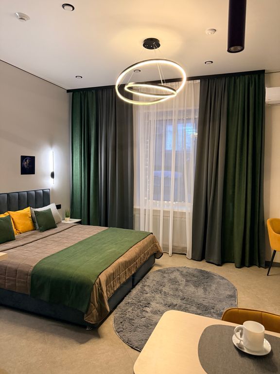 Четырёхместный номер Люкс с двуспальной кроватью