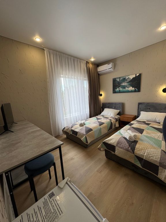 Двухместный номер с 2 отдельными кроватями улучшенный с видом на горы