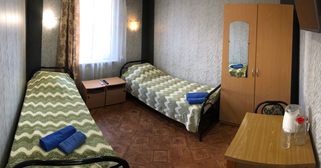 Двухместный номер с 2 отдельными кроватями первая категория