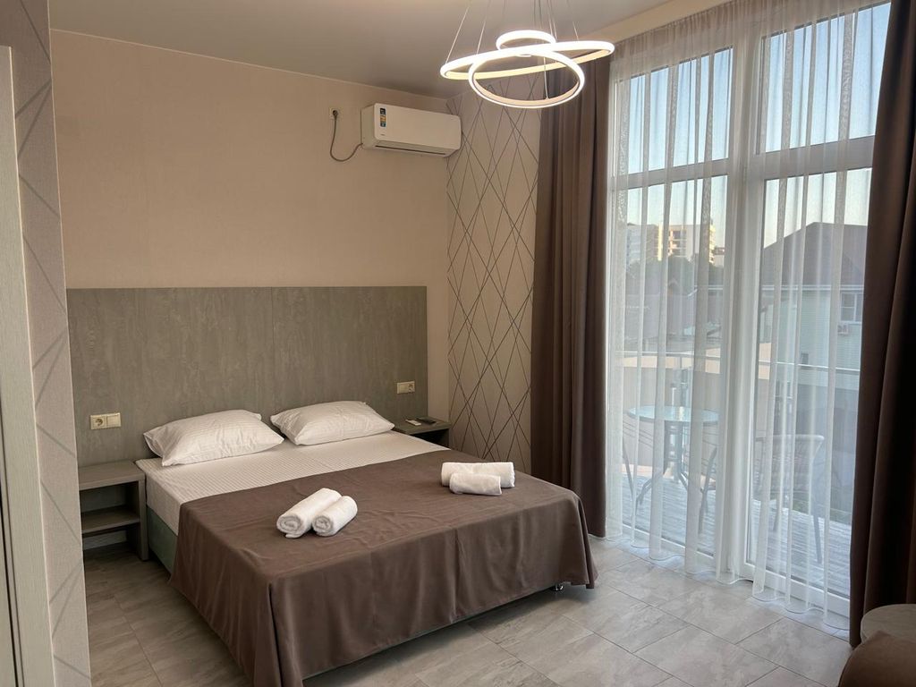 Четырёхместный номер Четырехместный Комфорт с балконом